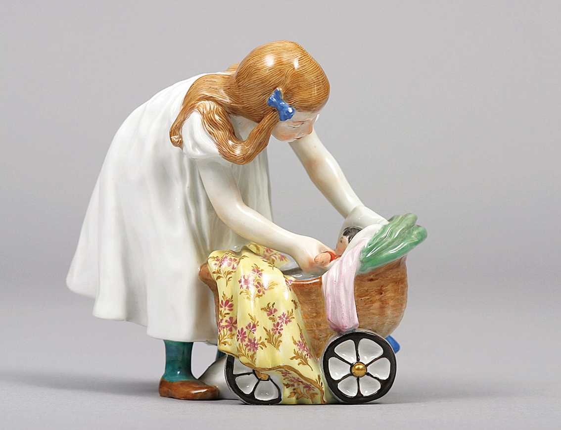 A Hentschel child 'girl with doll's pram'