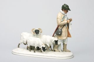 An art nouveau group 'Shepherd with his flock of sheep'