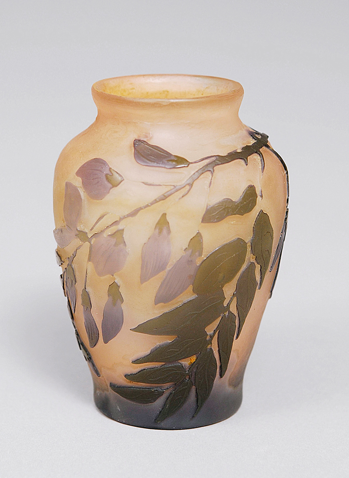 A small art-nouveau vase with wisterias