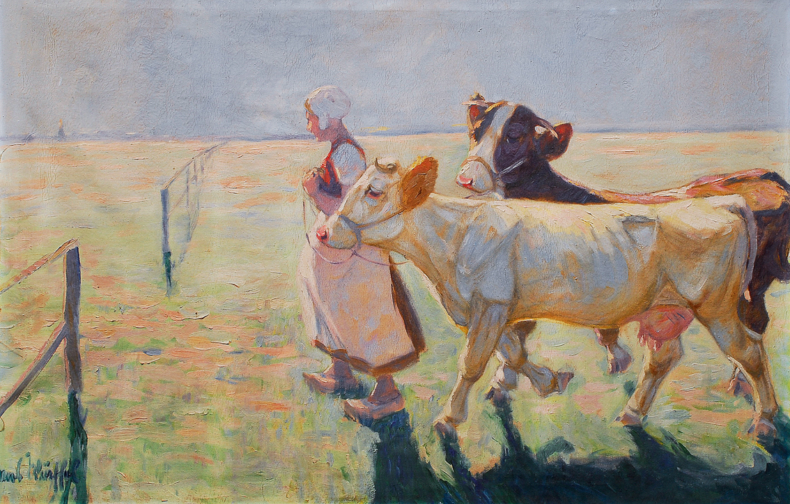 Junge Frau mit Kühen
