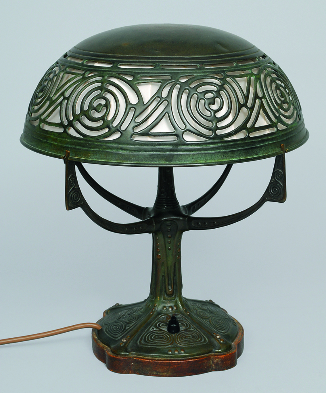 An art nouveau bronze table lamp