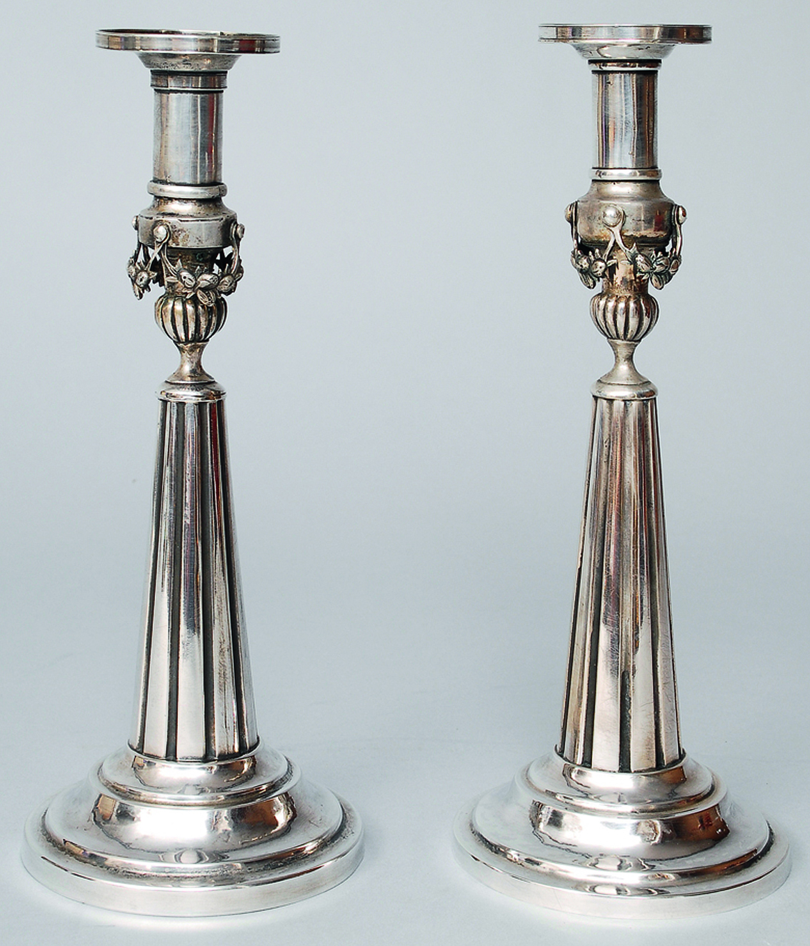 A pair of Dresden table candle holders