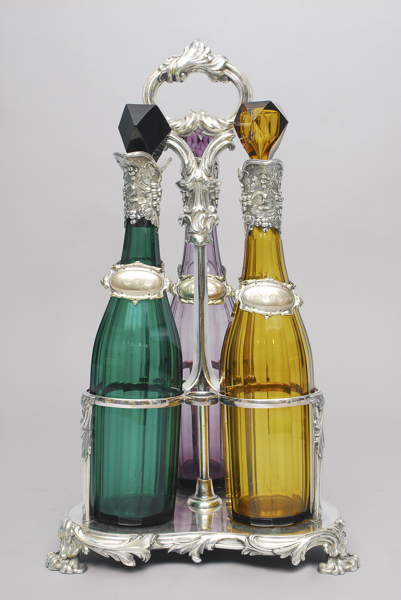 An english liquor set with 3 glas decanters