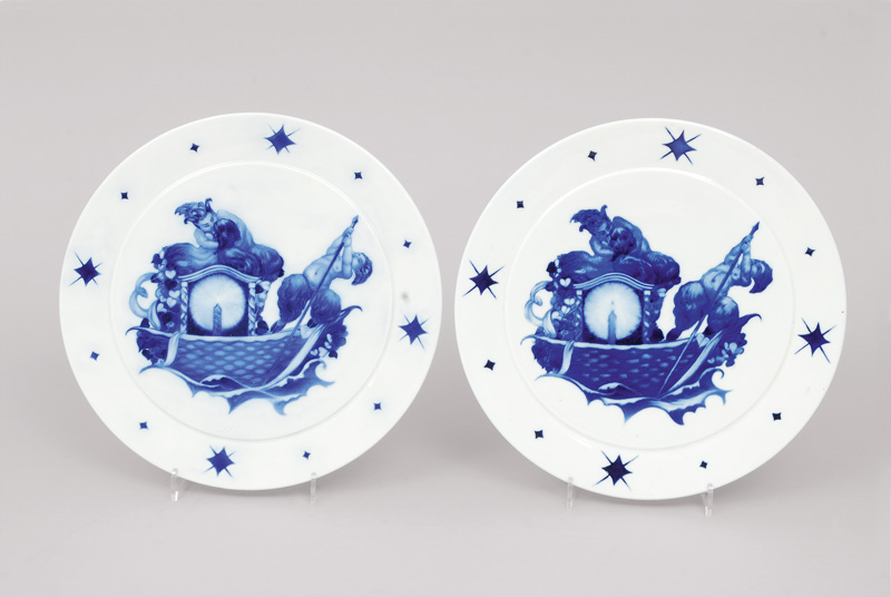 A pair of decorative wal plates 'cruise into the new year'