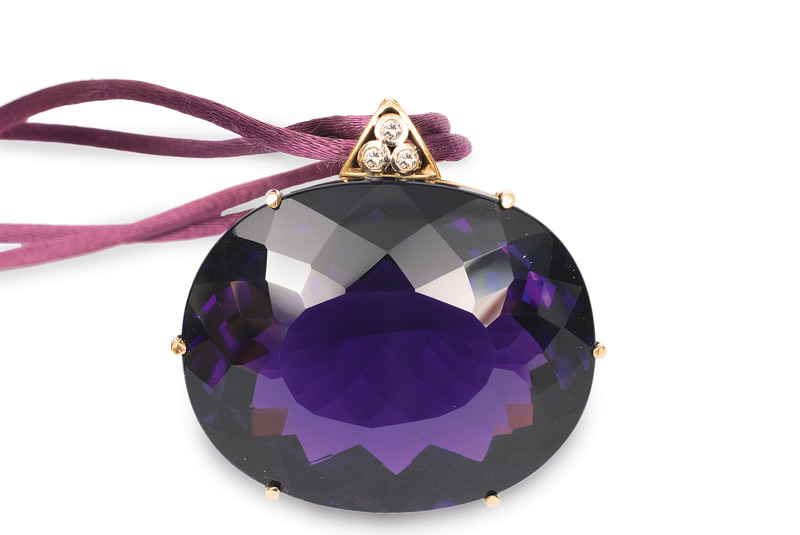 A very large amethyst diamond pendant