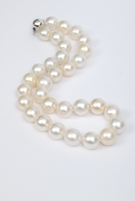 A Southsea pearl with diamond clasp