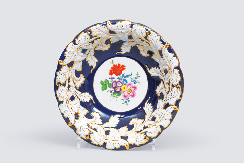 A big cobalt blue grounded bowl with flower decoration