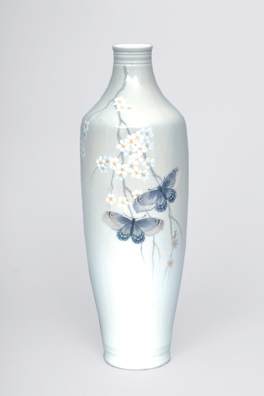 A slim baluster-shaped vase with butterflies and cherry blossoms