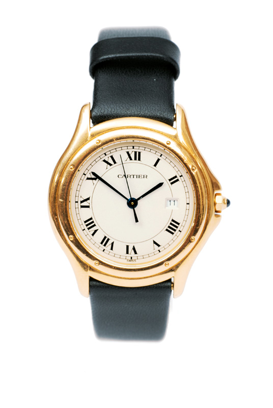 A gentlemen"s wrist watch by Cartier