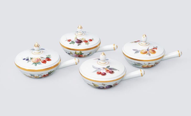 A set of 4 small pans with fruit painting and gilded rim