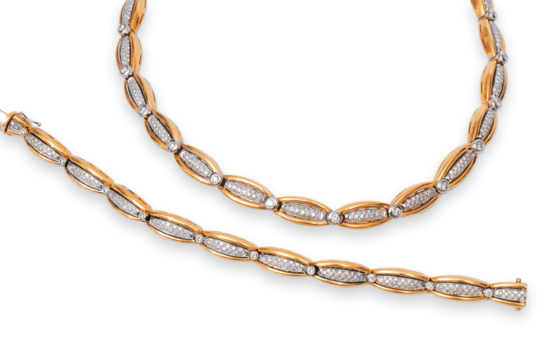 A diamond parure of a necklace and a bracelet