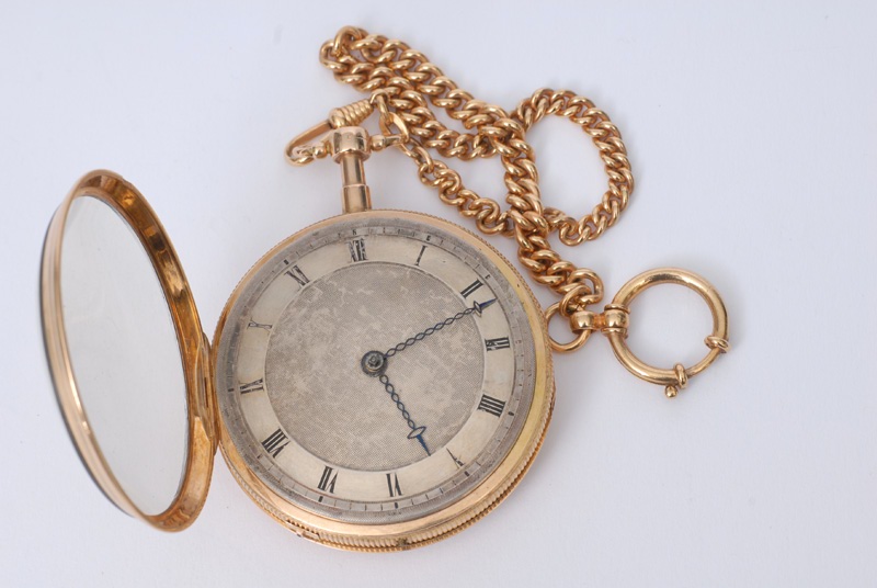 A big chiming pocket watch with watch chain