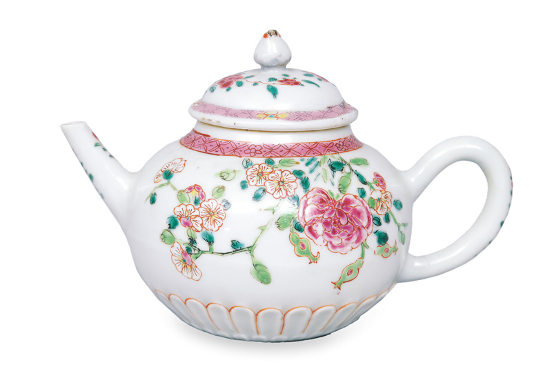 A teapot with flower painting