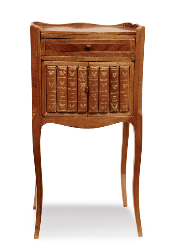 A small cabinet with mock-up book in the style of Louis Quinze