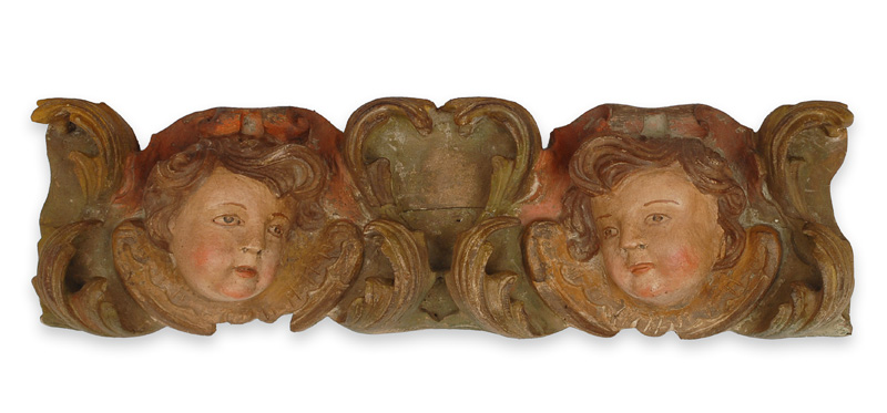 A Baroque supraporta with ornaments of putti