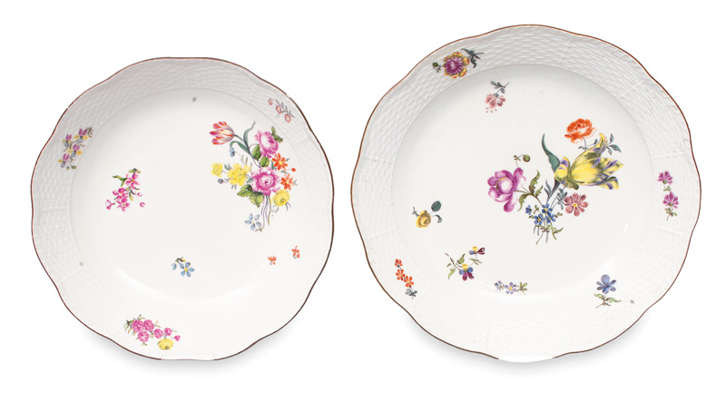 A pair of bowls with floral decoration and ozier relief