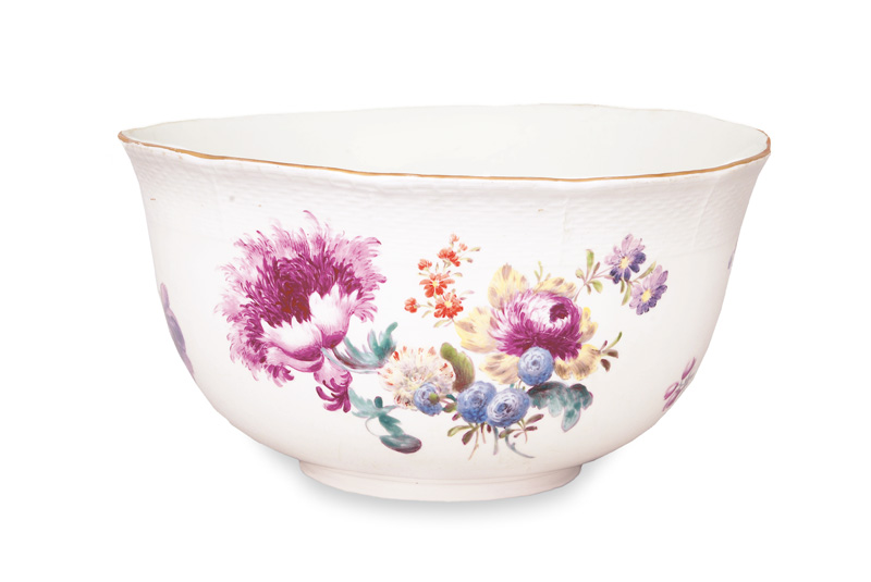 A large round bowl with floral decoration