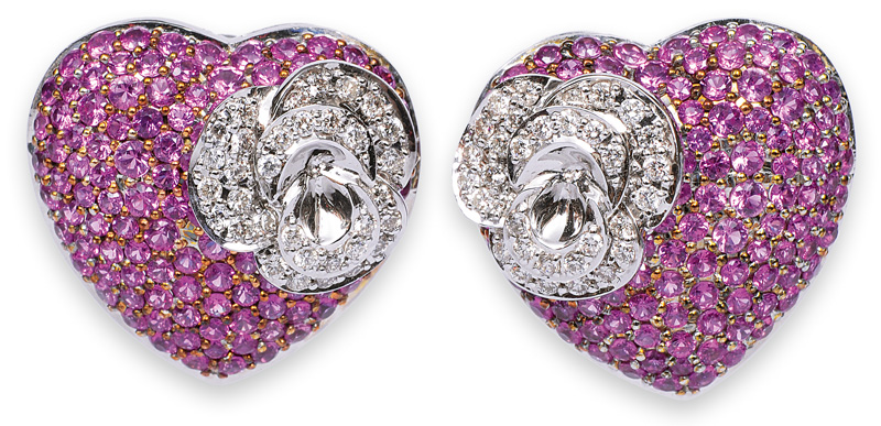 A pair of heartshaped pink sapphire earrings