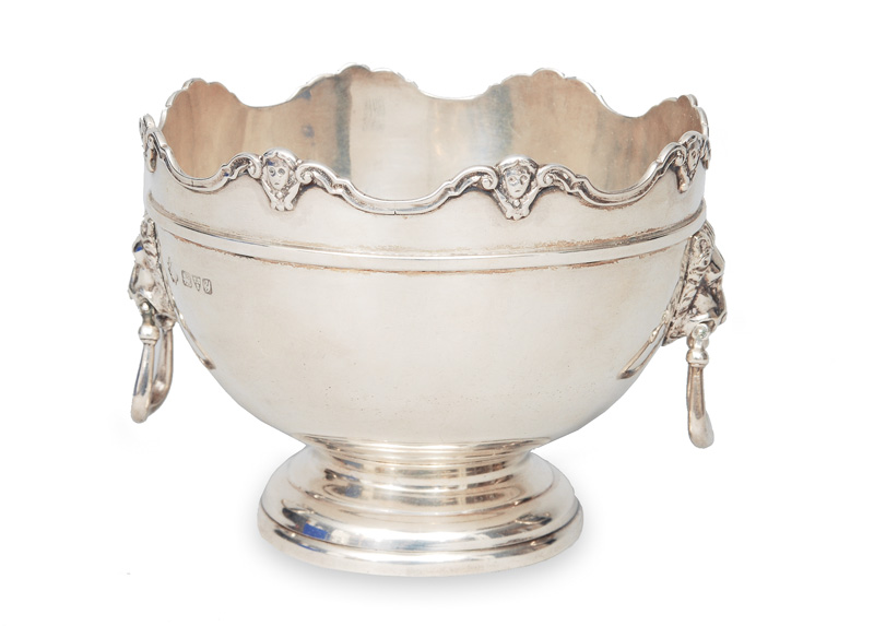 An English sugar bowl with lion head-shaped handle