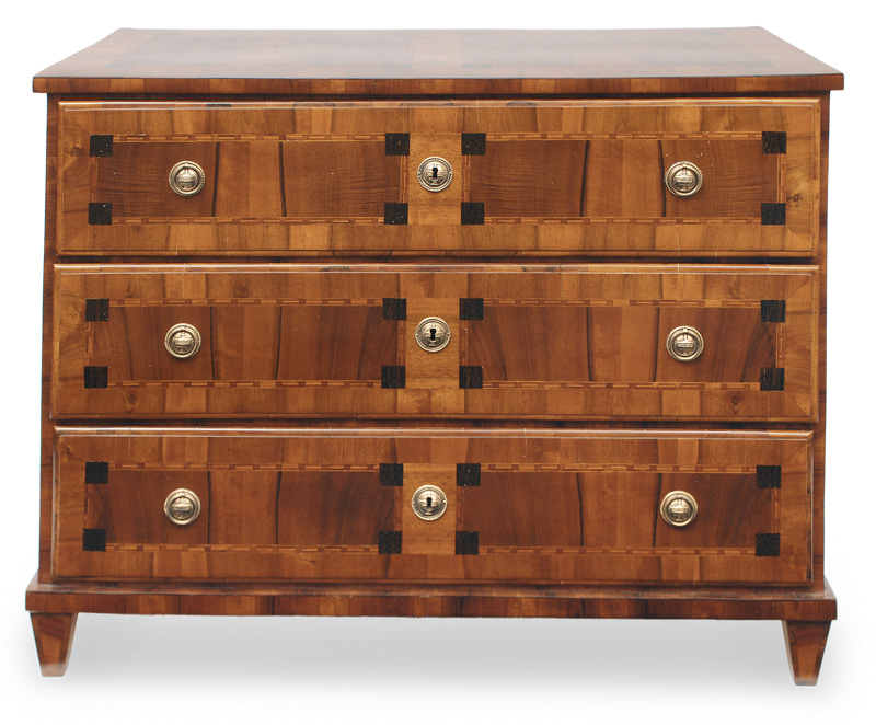 An elegant Louis Seize chest of drawers