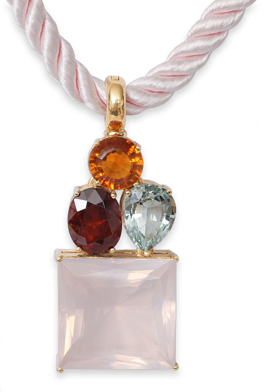 A citrine rose quartz amethyst pendant with silk necklace