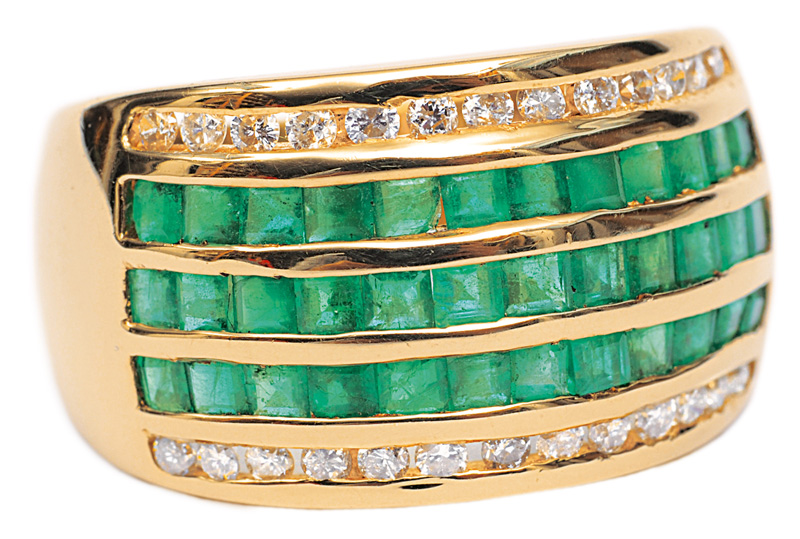 An emerald diamond ring