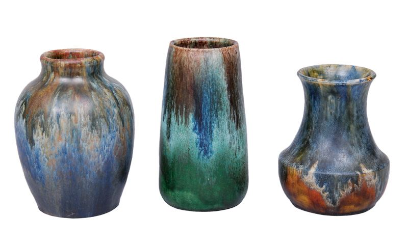 A set of 3 Art Nouveau vases with running glaze