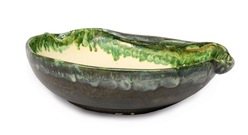 A hug Art Nouveau bowl with running glaze