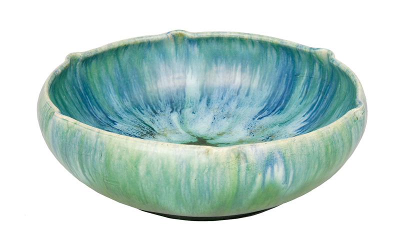 An Art Nouveau bowl with turquoise running glaze