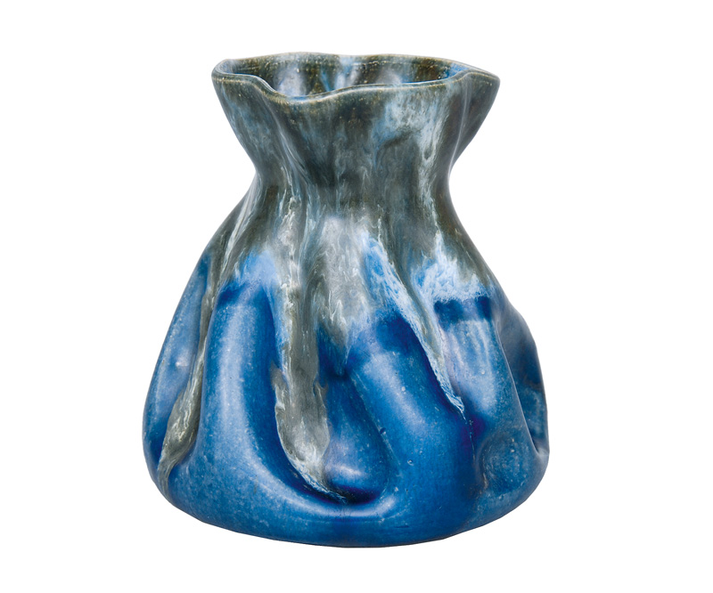 An Art Nouveau vase with running glaze