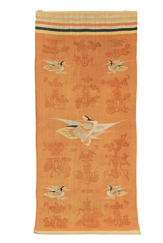 A tapestry with cranes