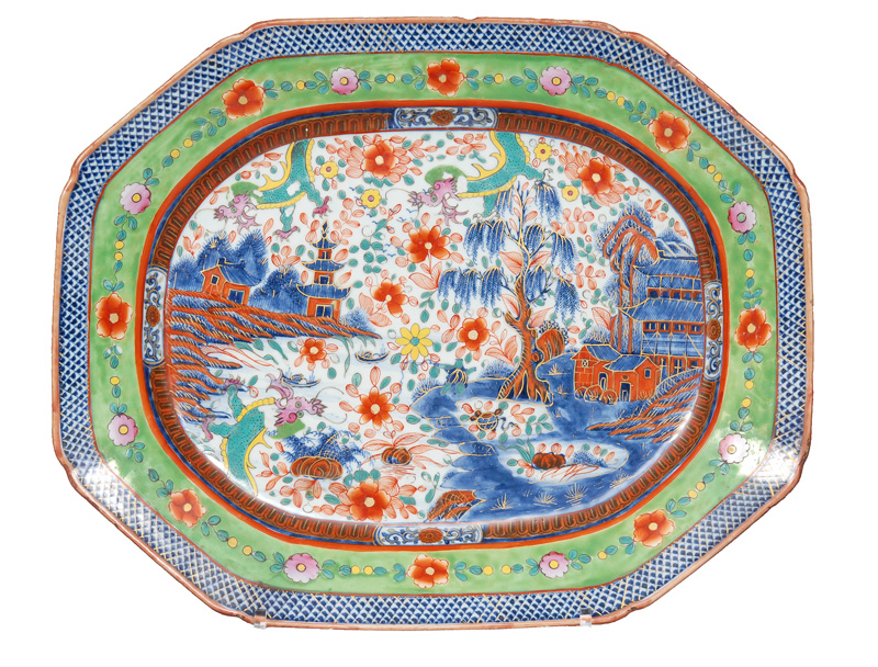 An octogonal platter with landscape and dragons