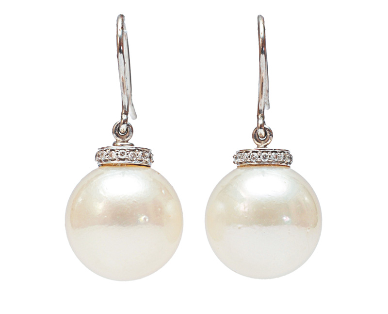 A pair of Southsea diamond earrings A pair of Southsea diamond earrings