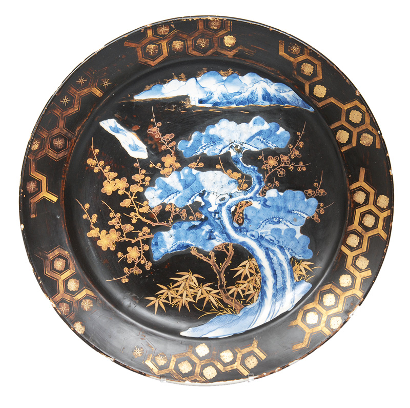 An Arita plate with black lacquere