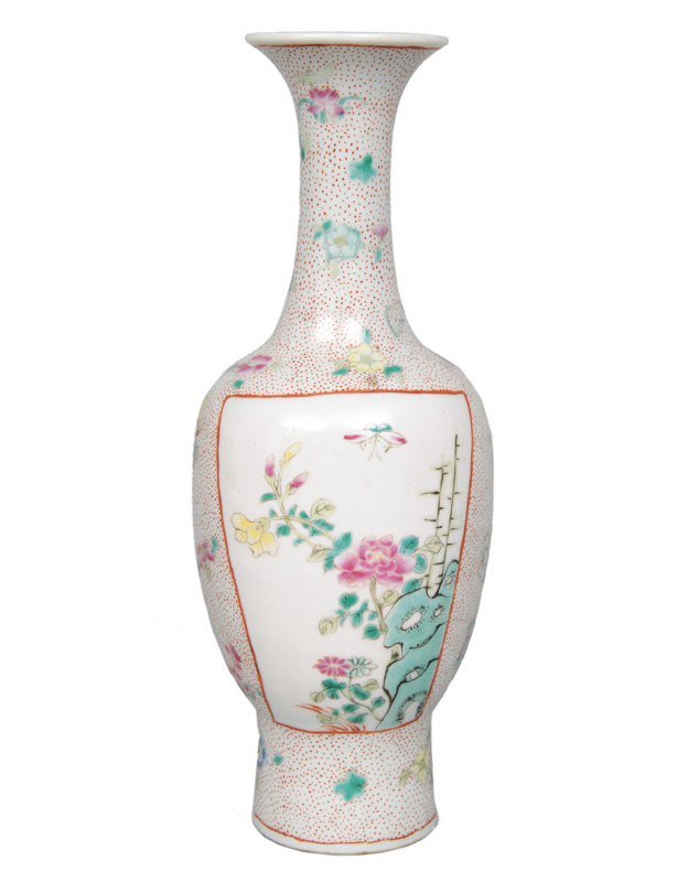 A small vase with floral decoration