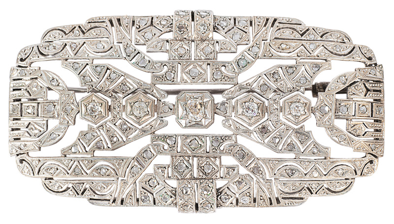 A large Art-déco diamond brooch
