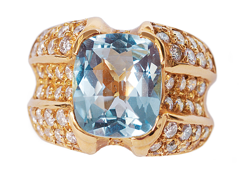 A large aquamarin diamond ring