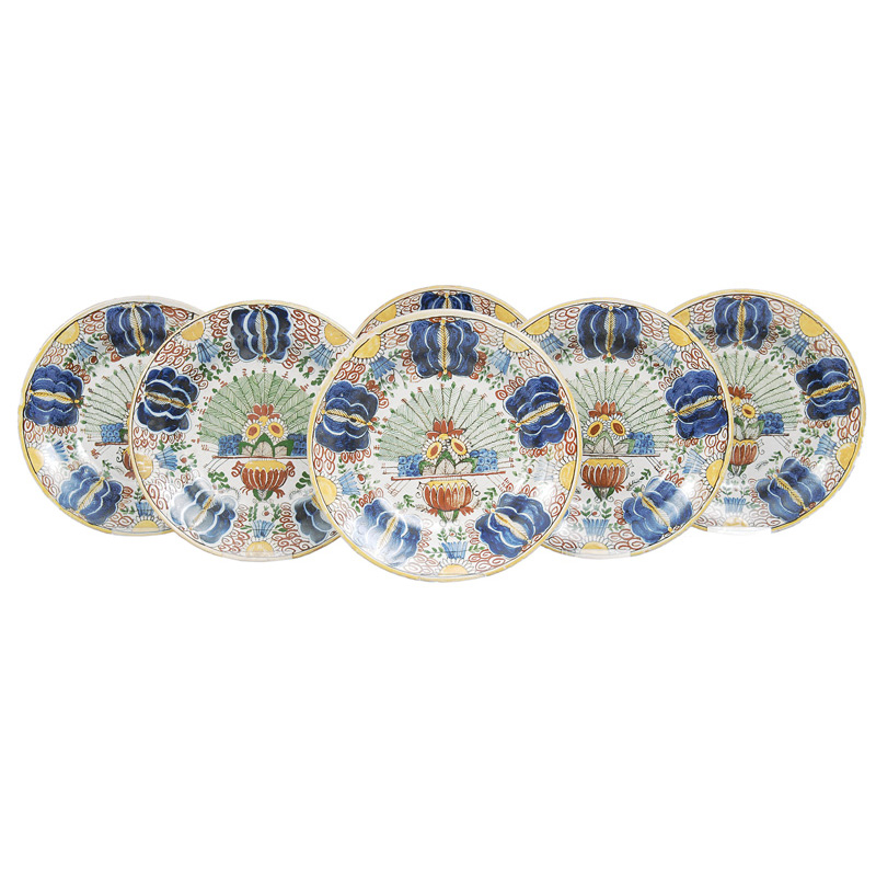 A set of 6 faience plates with floral decor