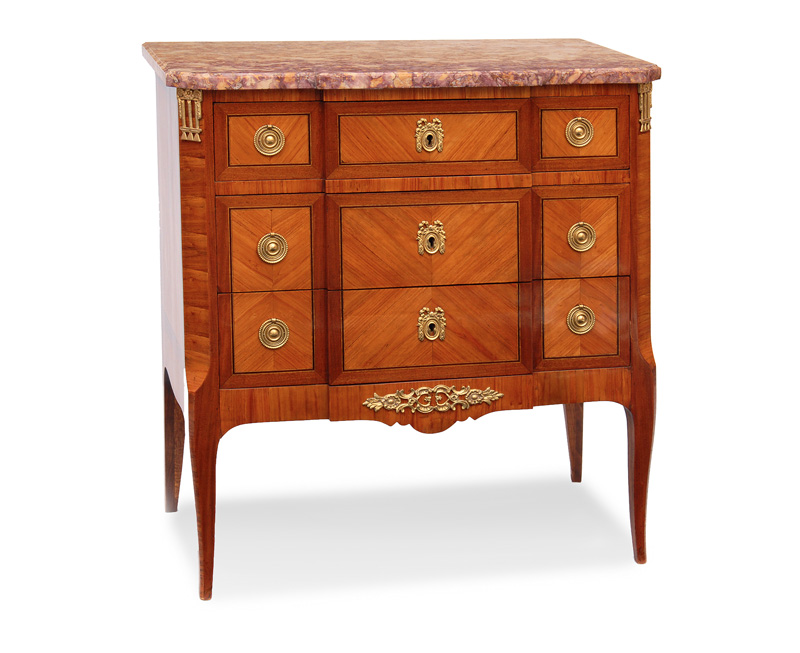 An elegant chest of drawers in the french Transition style
