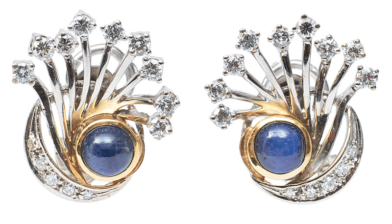 A pair of sapphire diamond earclips
