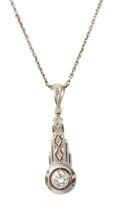 A petite Art-Nouveau diamond pendant with necklace