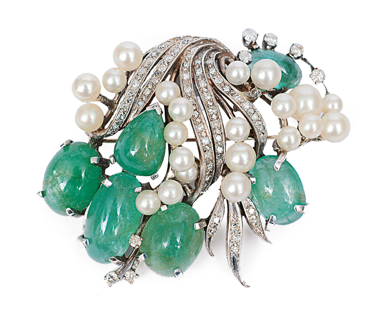 A large diamond pearl flower brooch with emeralds