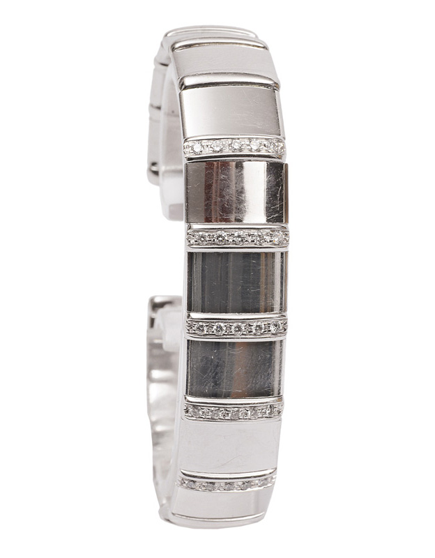 A bangle bracelet with diamonds