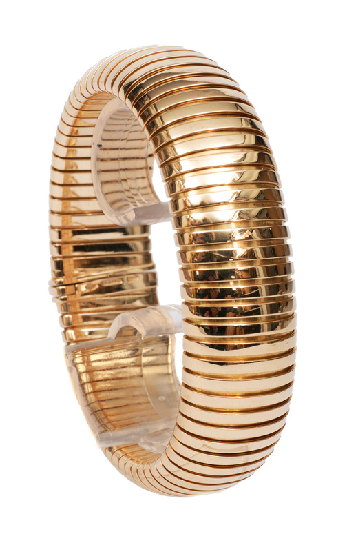 A golden bracelet from bulgari with matching ring