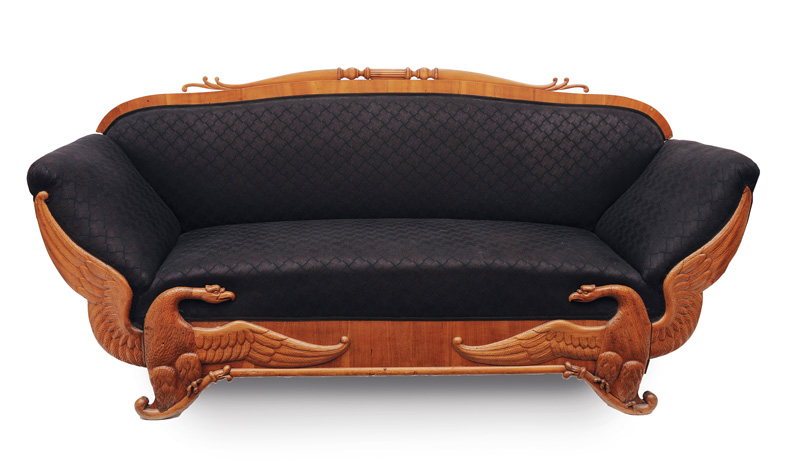 A rare Biedermeier sofa with griffin decor