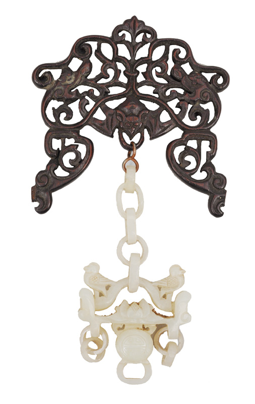 A jade-pendant with lotus and birds
