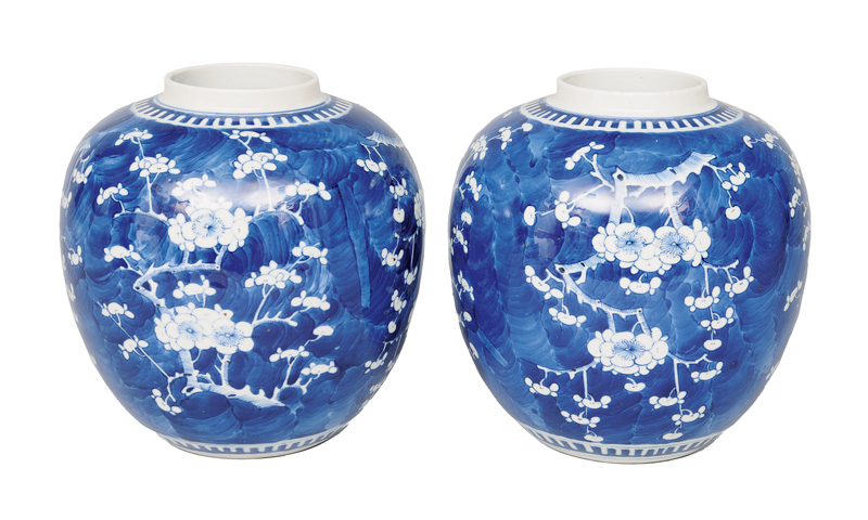 A pair of ginger jars with plum blossoms