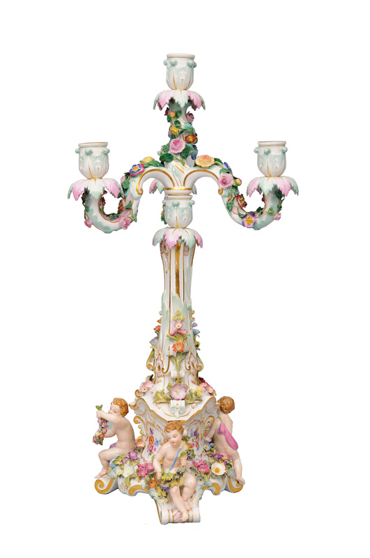 A rare candelabra with garlanded putti