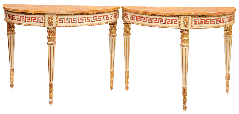 A pair of coloured demi-lune console tables