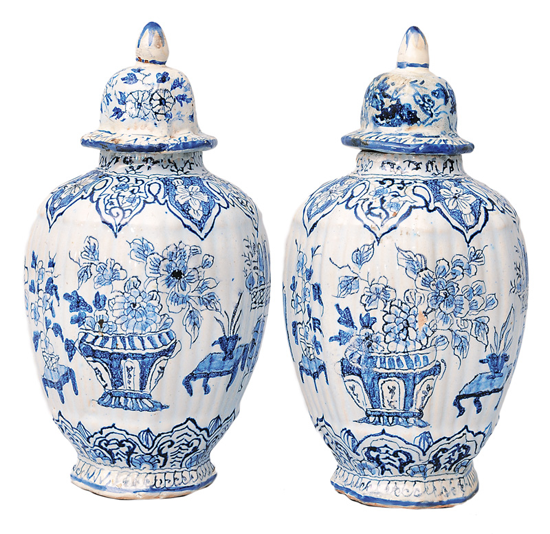 A pair of miniature vases with flower baskets